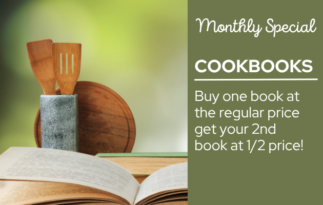 image of cookbook open with wooden spoons